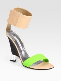 Stunning colorblock leather design with an architectural wedge and wrap-around ankle strap. Self-covered wedge, 5 (125mm)Leather upperLeather lining and solePadded insoleMade in ItalyOUR FIT MODEL RECOMMENDS ordering true size. 