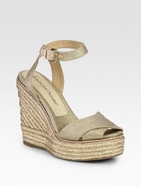 Espadrille wedge and canvas straps with a shimmering metallic finish. Hemp-covered wedge, 5 (125mm)Hemp-covered platform, 1 (25mm)Compares to a 4 heel (100mm)Metallic canvas and leather upperAdjustable ankle strapLeather and canvas liningRubber soleImported