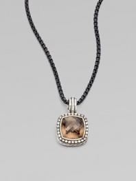 From the Moonlight Ice Collection. An enhancer of rich smokey quartz is surrounded by pavé diamonds.Diamonds, 0.45 tcw Smokey Quartz Sterling silver Enhancer width, about ½ ImportedPlease note: Chain sold separately. 
