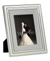 Always look elegant within the Chime picture frame from Vera Wang. Luxe silver plate with clean lines and beveled edges makes a lasting impression all its own. Interior rim features classic ribbed detail.