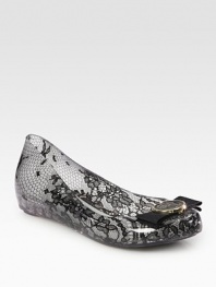 Lovely lace enclosed in a glossy flat, finished with a grosgrain bow, owl detail and subtle peep toe. Rubber upperRubber lining and solePadded insoleImportedOUR FIT MODEL RECOMMENDS ordering one half size down as this style runs large. 