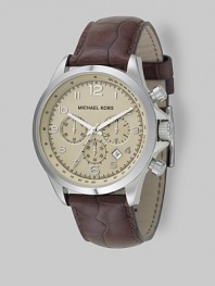 Superior style in stainless steel with heritage-inspired chronograph detail on an embossed leather strap. Quartz movement Water-resistant to 10 ATM Stainless steel case Round case; 44mm diameter (1.73) Three chronograph sub dials Arabic numerals and hour markers Date display at 4:00 Second hand Embossed leather strap Imported 