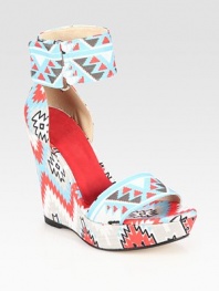 Secured by a wide Velcro® strap, a vibrant tribal print defines this soft linen design. Self-covered wedge, 4½ (115mm)Covered platform, 1 (25mm)Compares to a 3½ heel (90mm)Printed linen upperLeather lining and solePadded insoleImportedOUR FIT MODEL RECOMMENDS ordering true size. 