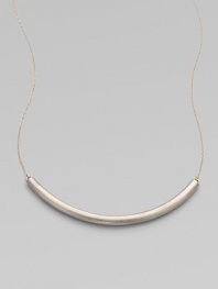 Eye-catching in its elegant simplicity, a gracefully curved, matte-finished silver bar appears to float on a delicate golden chain.SilverplatedGoldtoneLength, about 18Hook claspMade in USA