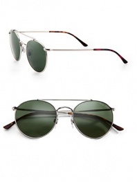 Small-frame metal sunglasses take a fresh approach to a cool vintage look. Available in matte silver frames with crystal green lenses.Metal100% UV ProtectionMade in Italy