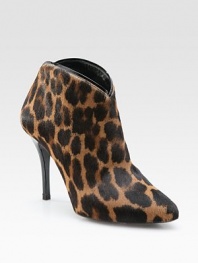 Playful leopard-print calf hair with a patent leather trim and an ultra-skinny heel. Self-covered heel, 4 (100mm) Calf hair upper Back zipper Leather lining and sole Padded insole Pattern may vary Made in ItalyOUR FIT MODEL RECOMMENDS ordering one half size up as this style runs small. 
