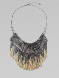 Positively dripping with fringe, this fabulous bib design has graduated two-tone chains cascading down the front.BrassLength, about 20Lobster claspImported