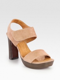 Soft suede style with a secure slingback, stacked heel and wide, adjustable straps. Stacked heel, 4 (100mm)Island platform, 1 (25mm)Compares to a 3 heel (75mm)Suede upperLeather lining and solePadded insoleMade in SpainOUR FIT MODEL RECOMMENDS ordering one size up as this style runs small. 