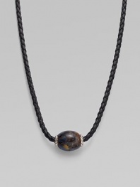 From the Ojime Collection. A contemporary look marries a marbled pietersite bead with a braided leather cord. Sterling silver accents Woven leather Length, 20 Width, about 3mm Chevron magnetic clasp Imported