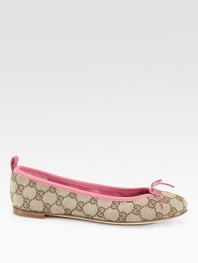 Signature GG flat with leather trim and leather bow detail. GG printed fabric upperLeather liningBuffed leather solePadded insoleMade in ItalyOUR FIT MODEL RECOMMENDS ordering one half size down as this style runs large. 
