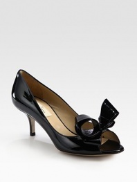 Simply divine patent leather with a kitten heel, peep toe and oversized bow adornment. Self-covered heel, 2½ (65mm)Patent leather upperLeather lining and solePadded insoleMade in Italy