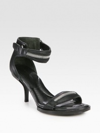 Casual leather silhouette with zipper details and a wrap-around ankle strap. Stacked heel, 3Leather upperLeather lining and solePadded insoleImportedOUR FIT MODEL RECOMMENDS ordering true size. 