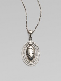 From the Kali Zen Collection. A graceful yet striking oval - with the Kali stepping-stone texture on the front, an open filigree back and rope chain edging - hangs from a sterling silver woven chain. Sterling silver Chain length, about 36 Pendant length, about 2½ Pendant width, about 1¼ Lobster clasp Made in Bali