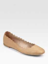 Metallic leather and scalloped edges make this ballerina shine.Stacked heel, ½ (15mm) Round toe Leather lining and sole Padded insole Made in ItalyOUR FIT MODEL RECOMMENDS ordering true size.. 