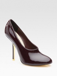 Polished faux patent leather in a sultry, low-cut silhouette with intricate stitching and a high vamp. Self-covered heel, 5 (125mm) Faux patent leather upper Leather lining Paint-coated faux leather sole Padded insole ImportedOUR FIT MODEL RECOMMENDS ordering one size up as this style runs small. 