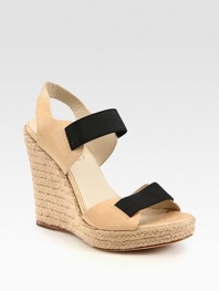 Comfy-chic espadrille wedge accompanied by soft leather straps and contrasting elastic trim. Braided hemp wedge, 4 (100mm)Braided hemp platform, 1 (25mm)Compares to a 3 heel (75mm)Elastic and leather upperLeather lining and solePadded insoleImported