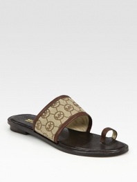 Classic canvas monogram design with rich leather trim and a trend-forward toe ring. Leather and printed canvas upperLeather liningRubber solePadded insoleImported