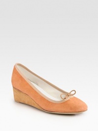 Buttery suede with a self-covered wedge, elastic trim and subtle string bow. Self-covered wedge, 2 (50mm)Suede upperLeather liningRubber solePadded insoleMade in FranceOUR FIT MODEL RECOMMENDS ordering one size up as this style runs small. 