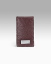 Stamped calfskin money clip with magnetic closure. 1¼W X 2¾H Made in Italy