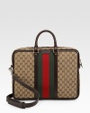 GG fabric briefcase with signature web detail. Double zip top closure with lock Double handles Adjustable, detachable shoulder strap Red/green/red signature web Light gold hardware Interior zip, cell phone and PDA pockets Padded laptop compartment with tab snap 2.4W X 12.2H X 16.5L Made in Italy 