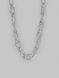 Links of various sizes and shapes join together in a long, versatile chain of polished sterling silver. Lobster claw clasp 37½ long Imported