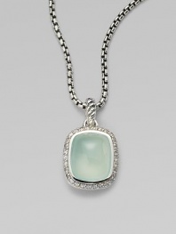 From the Noblesse Collection. A beautiful center stone of aqua chalcedony surrounded by a row of brilliant diamonds on a sterling silver box link chain. Aqua chalcedonyDiamonds, .3 tcwSterling silverLength, about 17Pendant size, about ½Lobster clasp closureImported 