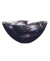 With a beautiful, smoky haze and contrasting strokes of color, this glass bowl is a true conversation piece. A handmade creation that will add zest to any room. Designed by Anna Ehrner for Kosta Boda.