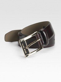 A smooth and sophisticated belt designed in fine calfskin leather with a shiny gold buckle. About 1 wide Imported 