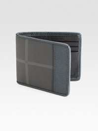 Iconic style that never fades, finely-crafted in checked PVC and leather.One billfold compartmentSix card slotsPVC/Leather4 x 3½Made in Italy