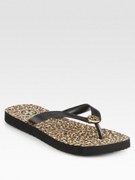 Tried-and-true style with a leopard-print footbed and signature designer emblem. Rubber upperSignature emblemImportedOUR FIT MODEL RECOMMENDS ordering one half size down as this style runs large. 