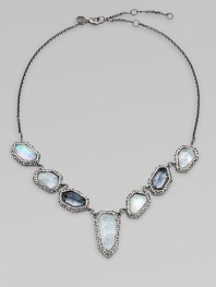 From the Miss Havisham Collection. A striking piece crafted of free-form linked stones of opal-colored white quartz and faceted glass in a gunmetal finish setting dotted with Swarovski crystals.White quartzCrystalGlassRuthenium plating and gunmetal platingLength, about 16 with 3 extenderLobster claspMade in USA