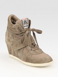 Sporty suede and canvas style, revived by a wide, self-covered wedge. Self-covered wedge, 3 (75mm)Suede and canvas upperLeather liningRubber solePadded insoleImportedOUR FIT MODEL RECOMMENDS ordering true whole size; ½ sizes should order the next whole size up. 