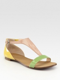 Colorblocked patent leather with an on-trend, adjustable t-strap. Patent leather upperLeather lining and soleImported