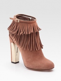 On-trend suede fringe emboldened by a partially metal heel and dainty, wrap-around buckle. Suede and metal heel, 4½ (115mm) Suede upper Side zipper Leather lining and sole Padded insole Made in ItalyOUR FIT MODEL RECOMMENDS ordering one half size up as this style runs small. 
