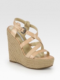 Elevated espadrille wedge with adjustable leather criss-cross straps and a secure slingback. Hemp-covered wedge, 5½ (140mm)Covered platform, 1½ (40mm)Compares to a 4 heel (100mm)Leather upperLeather liningRubber solePadded insoleImportedOUR FIT MODEL RECOMMENDS ordering true size. 