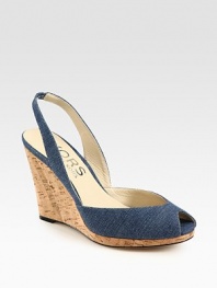 Comfort-minded denim wedge with a stretchy slingback and low-cut upper. Cork wedge, 4 (100mm)Cork platform, 1 (25mm)Compares to a 3 heel (75mm)Denim upperLeather lining and solePadded insoleImported
