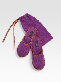 A pair of classic toweling slippers designing in plush cotton with multi-stripe detail and a convenient drawstring pouch. Includes pouch Cotton Machine wash Made in Italy 