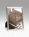 Modern silverplate design holds a favorite photo vertically or horizontally. Polished cedar wood back Made in Italy