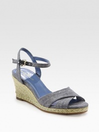 Denim canvas style with an adjustable, wrap-around ankle strap and traditional espadrille wedge. Hemp-covered wedge, 2½ (65mm)Hemp-covered platform, ½ (15mm)Compares to a 2 heel (50mm)Denim upperLeather liningRubber solePadded insoleImportedOUR FIT MODEL RECOMMENDS ordering true size. 