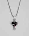 A bleeding heart of black onyx, in a lavish medieval setting of sterling silver, is accented with two tiny garnet drops and hangs from a silver box chain. Black onyx and garnet Sterling silver Chain length, about 20 Pendant length, about 1½ Lobster clasp Imported