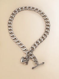 A signature Juicy style to wear on its own or adorn with a collection of your favorite charms. Attached heart and J charms 14½ long Signature crown toggle closure Imported