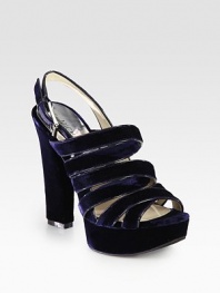 Rich, velvety design with an adjustable slingback, island platform and criss-cross straps. Self-covered heel, 5 (125mm)Island platform, 1 (25mm)Compares to a 4 heel (100mm)Velvet upperLeather liningRubber solePadded insoleImported