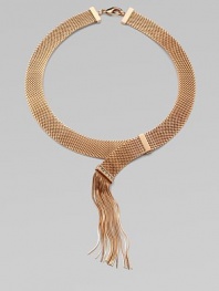 Striking in its simplicity, a flat strand of golden mesh with a glowing rose gold finish ends in a cascade of delicate fringe with Swarovski crystal accents.Crystal Rose goldplatedNecklace length, about 15¾Fringe length, about 4Lobster claspMade in Italy
