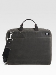 An updated classic with metropolitan style, crafted in sleek and sturdy waxed cotton with leather details.Zip closureTop handlesAdjustable shoulder strapExterior, interior zip pocketOrganizing pocketsFully lined12W x 16H x 3DImported