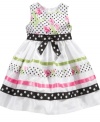 Pretty patterns will make your sweet girl light up in this darling dress from Rare Editions.