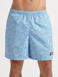 A bright option for the beach, board and beyond in quick-dry microfiber. Elastic waist Logo tab on left leg Side slash, back flap pockets Mesh lining Inseam, about 7 Polyester Machine wash Imported 
