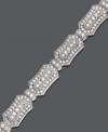 Unique design combines with extraordinary elegance. This beautifully-crafted bracelet features an intricate dot design covered in sparkling round-cut diamond (3 ct. t.w.) set in 14k white gold. Approximate length: 7-1/2 inches.
