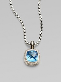 From the Albion Collection. A beautiful faceted blue topaz center stone surrounded by dazzling diamonds. Diamonds, .3 tcw Blue topaz Sterling silver Size, about ½L X ½ W Imported Please note: Chain sold separately. 