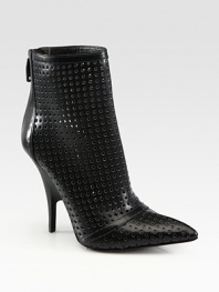 Allover perforations and an exposed back zipper amp up this ankle-grazing leather design. Self-covered heel, 2 (50mm)Leather upperExposed back zipperLeather lining and solePadded insoleImported