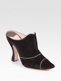 Soft velvet classic defined by leather trim and a contoured heel. Self-covered heel, 4 (100mm)Velvet and leather upperLeather lining and solePadded insoleMade in ItalyOUR FIT MODEL RECOMMENDS ordering one size up as this style runs small. 